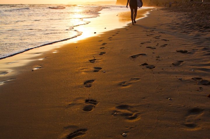Trauma informed Therapy Beach scene representing stepping out of the legacy of trauma. Trauma-informed counselling and nervous system support